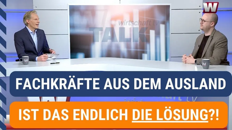 Standbild aus dem wirtschaft tv Talk: Frank Ewerle im Fernsehstudio im Gespräch mit Chefanchor Sascha Oliver Martin